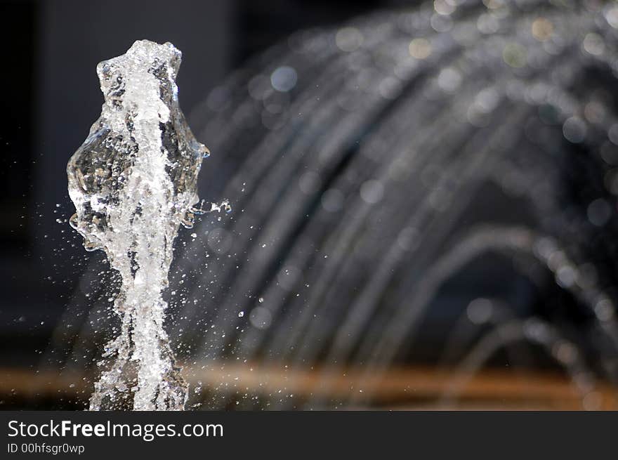 Water flowing from a fountain photgraphed at at very high shuter speed. Water flowing from a fountain photgraphed at at very high shuter speed