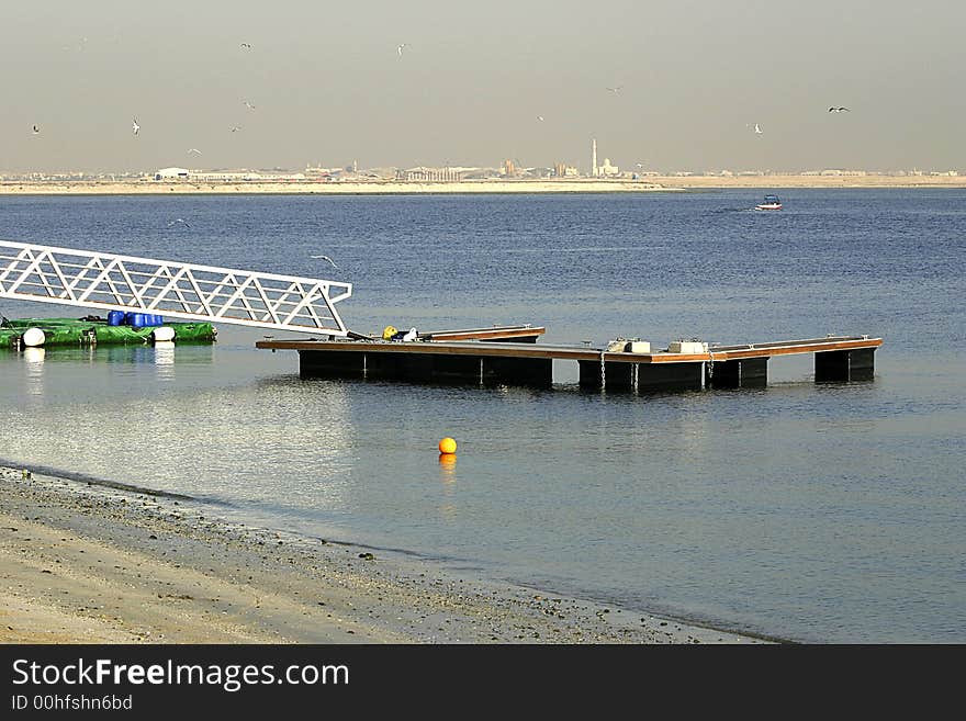 Small dock for private yacht at the creek in Dubai United Arab Emirates. Small dock for private yacht at the creek in Dubai United Arab Emirates