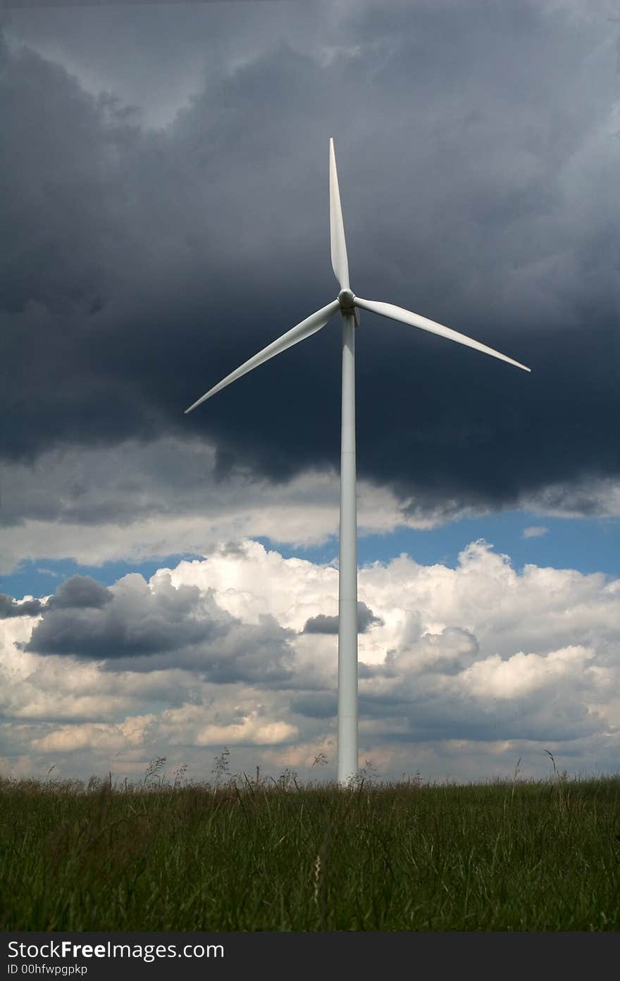 Windmill In Green Field