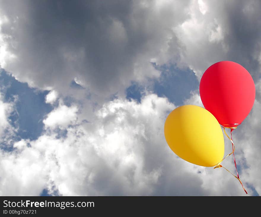 Two balloons escaping into the clouds. Two balloons escaping into the clouds