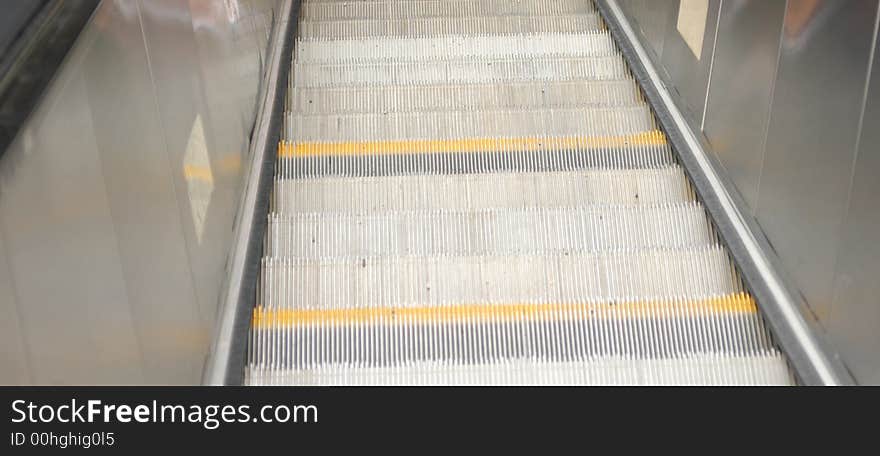 Steps on the escalator leading to the subway. Steps on the escalator leading to the subway