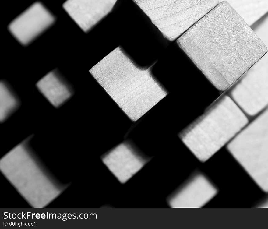 Abstract study in B&W using wooden puzzle blocks. Abstract study in B&W using wooden puzzle blocks