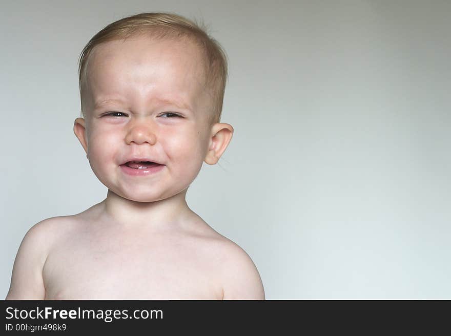 Image of a cute laughing toddler