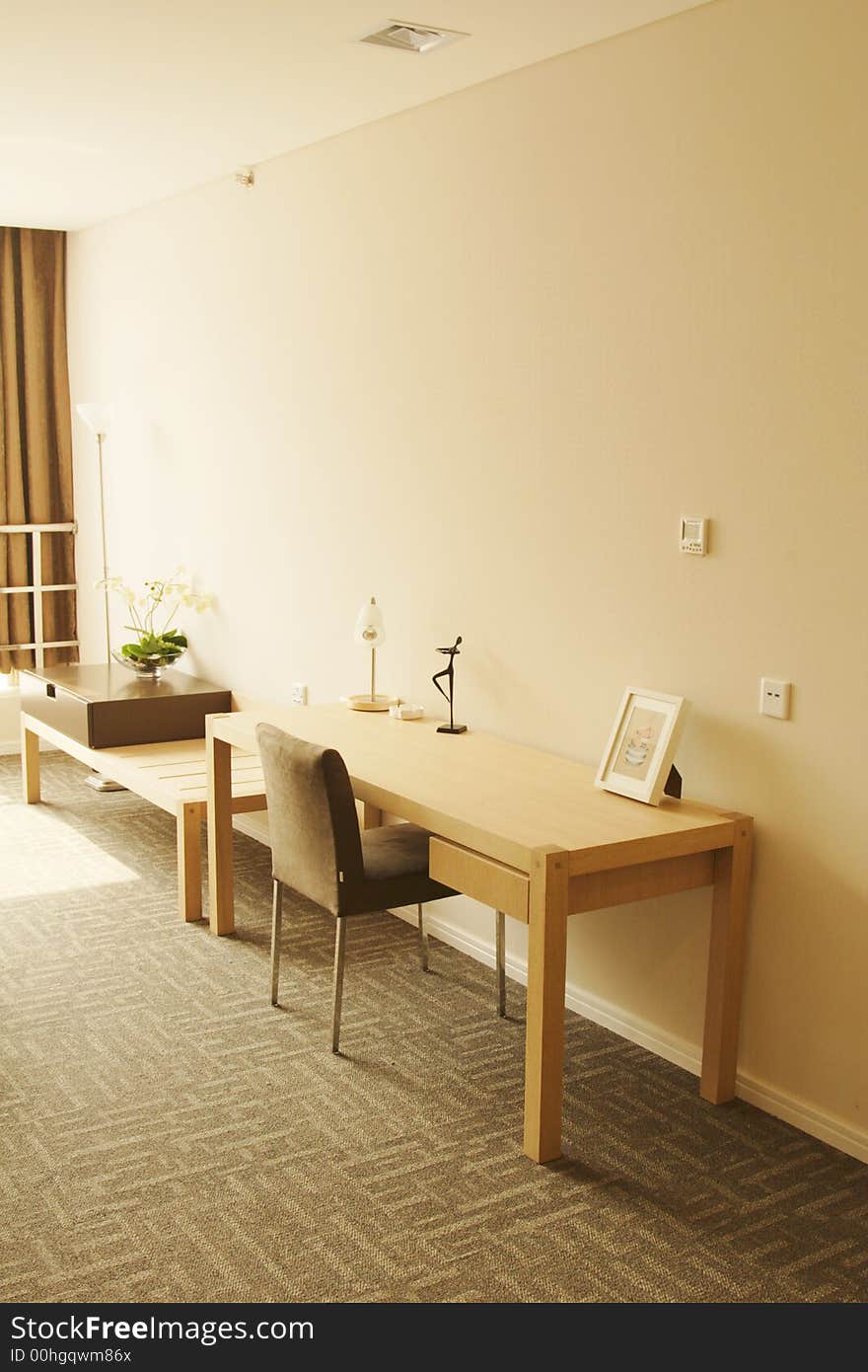 Timber desk and TV table with decorations