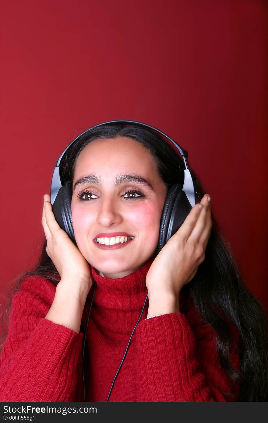 Digital photo of a woman listening music.