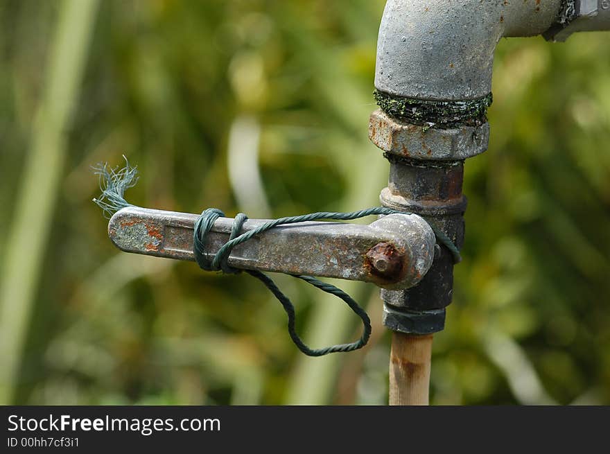 Rusty Water Tap In The Garden