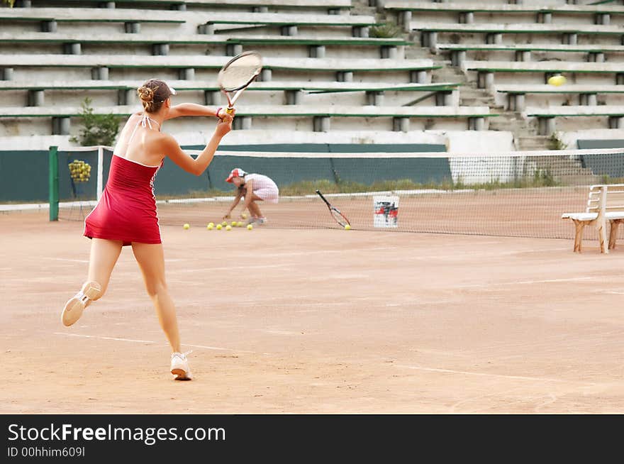 Blond Girl Playing Tennis