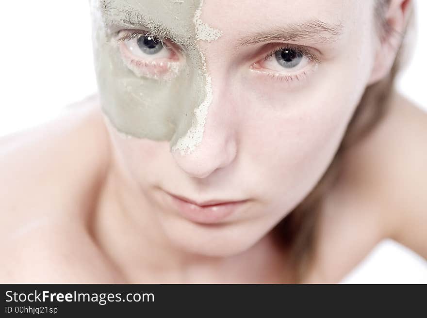 Nude woman model caring her body in the studio. Nude woman model caring her body in the studio