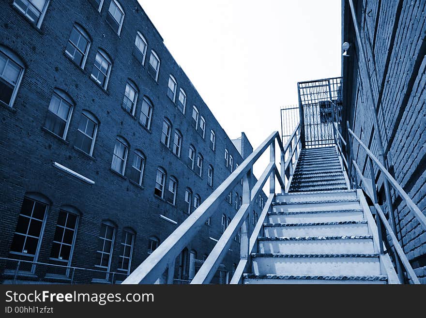 Metal stairway going up in an old downtown building, Los Angeles, California, USA.