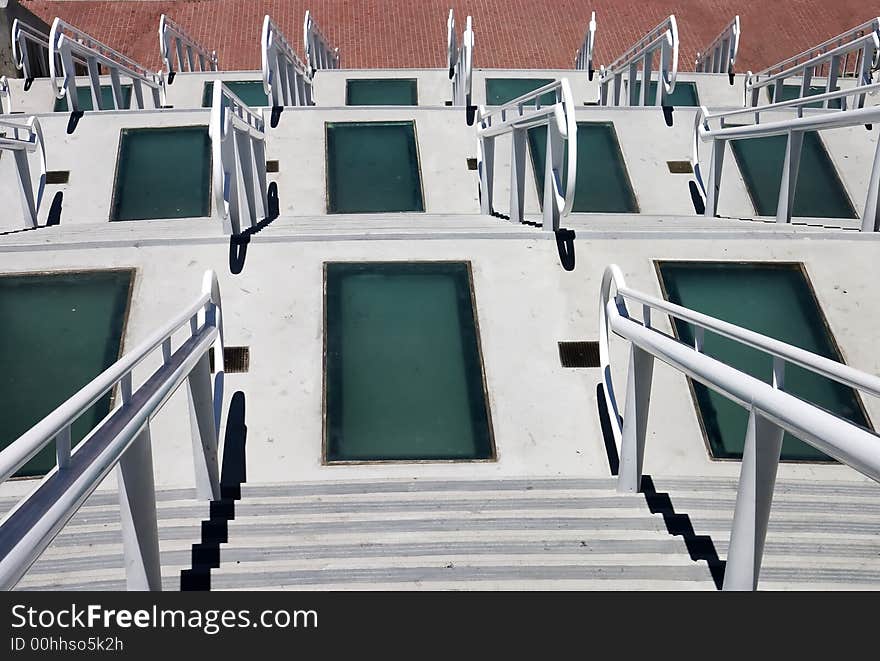 Rows of descending modern stairs. Rows of descending modern stairs