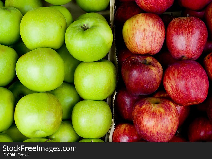 Photo from above of two group of green and red apple. Photo from above of two group of green and red apple.