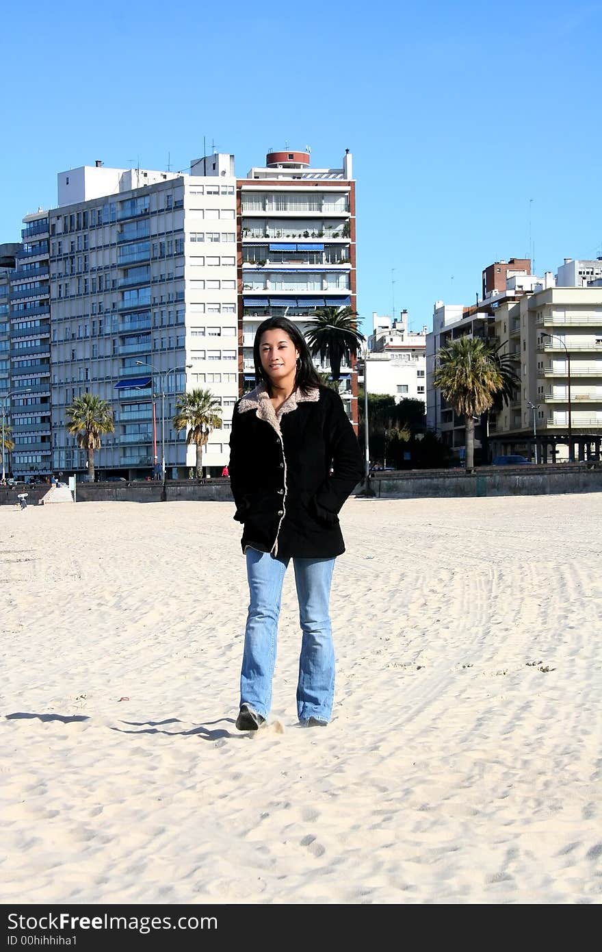 Digital photo of a young woman at the beach of Montevideo. Digital photo of a young woman at the beach of Montevideo.