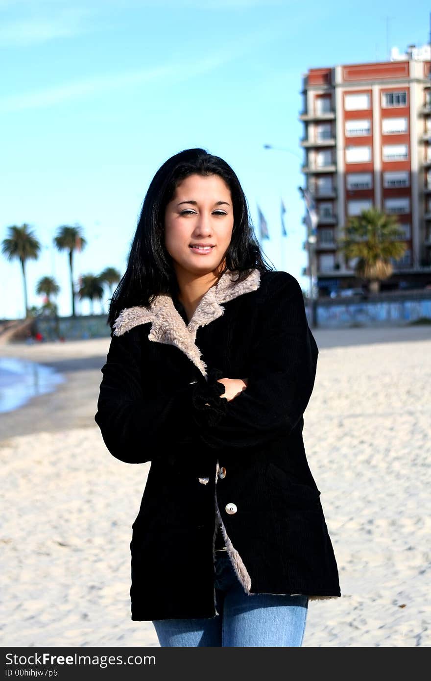 Digital photo of a young woman at the beach of Montevideo. Digital photo of a young woman at the beach of Montevideo.