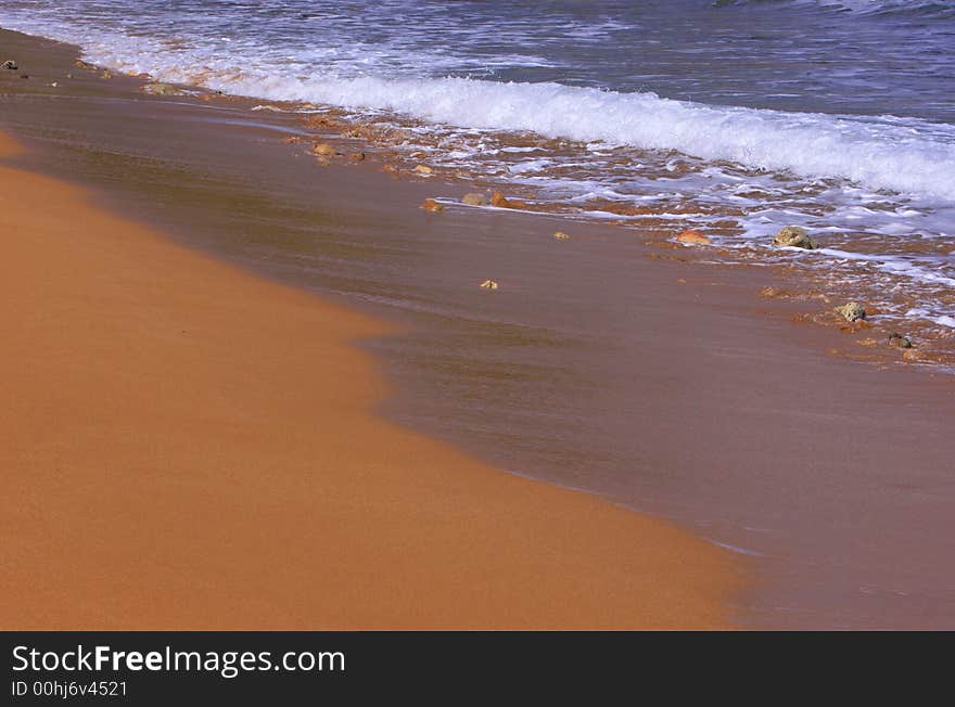 Malta's most picturesque beach famed for its red fine sand and blue Mediterranean waters. Malta's most picturesque beach famed for its red fine sand and blue Mediterranean waters