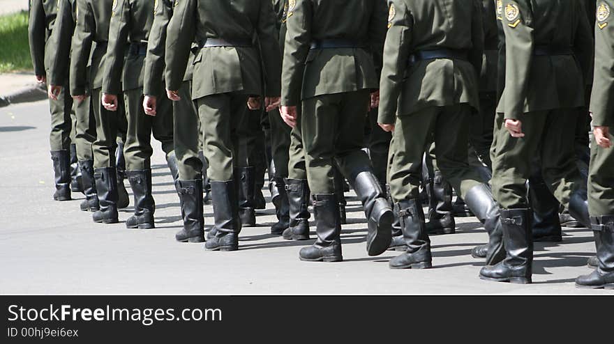 The division of soldiers carries out transition on city street. The division of soldiers carries out transition on city street