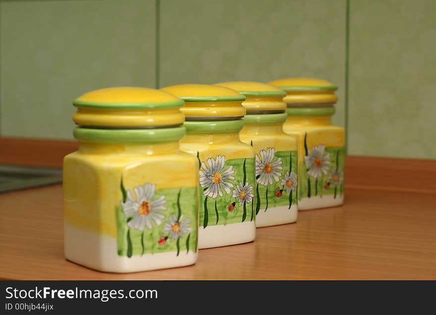 Yellow set for spices from four jars