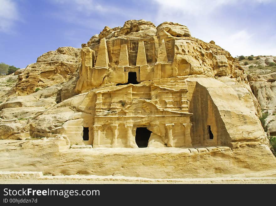 Tombs against blue sky in petra