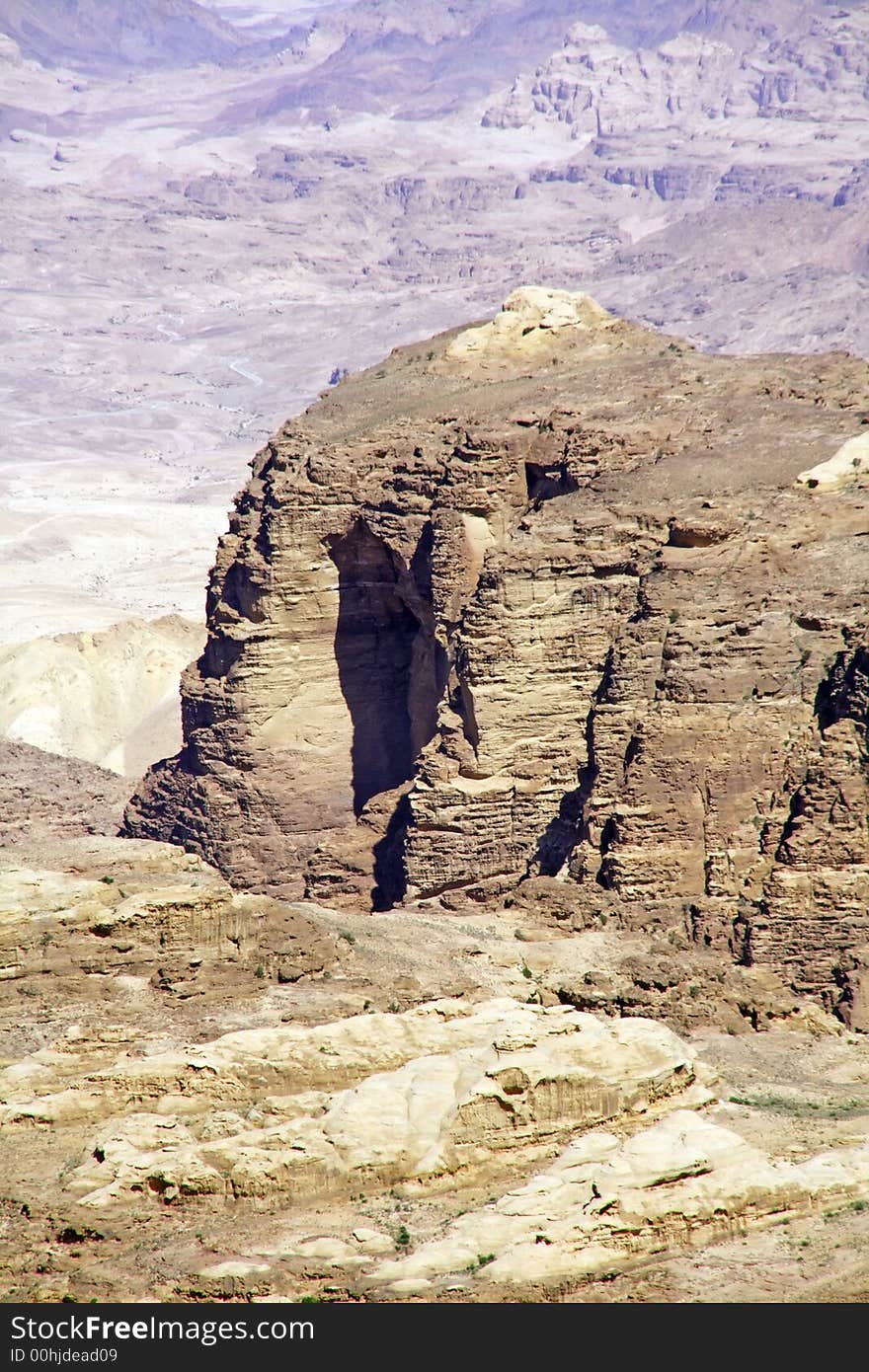 View of a rock with petra on the background. View of a rock with petra on the background