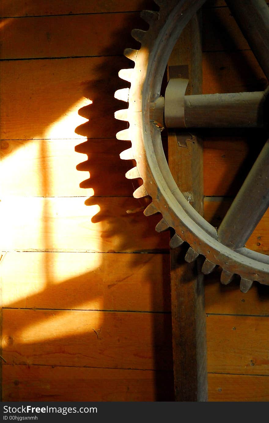 Old mill gear-sun shadow