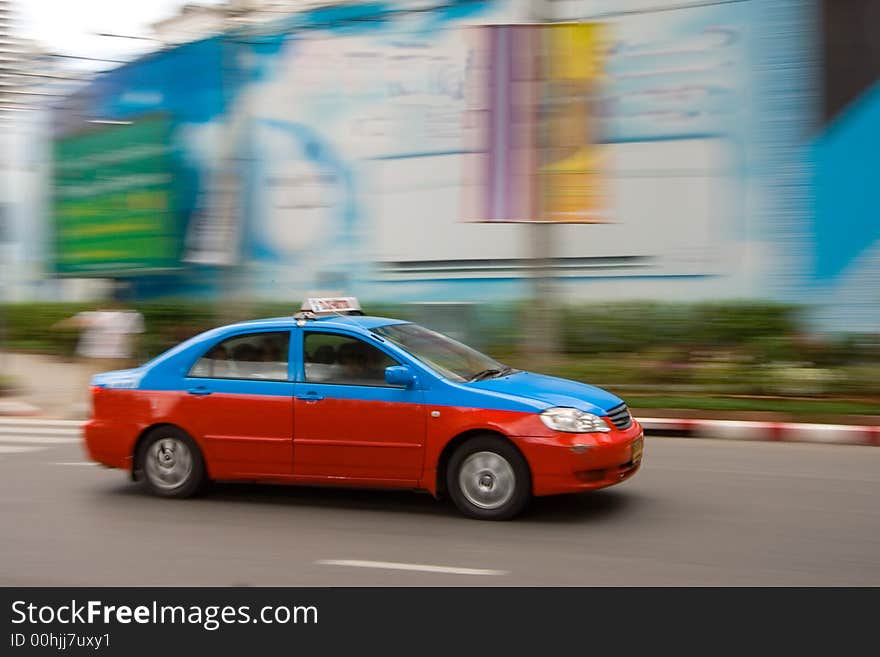 Fast taxi in city traffic