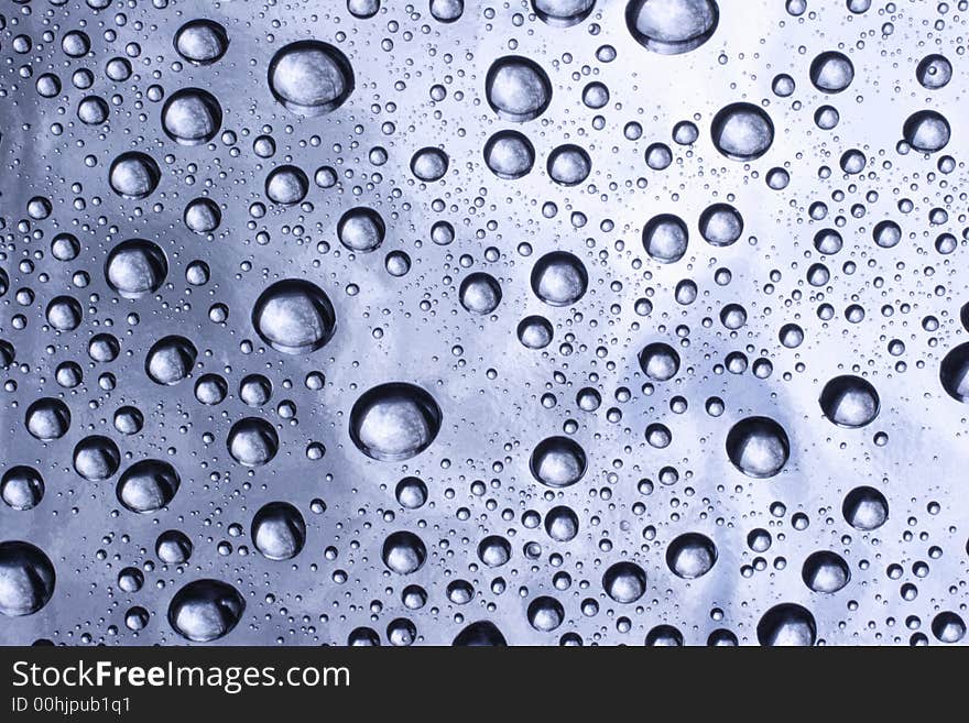 Drops of water on a reflecting surface