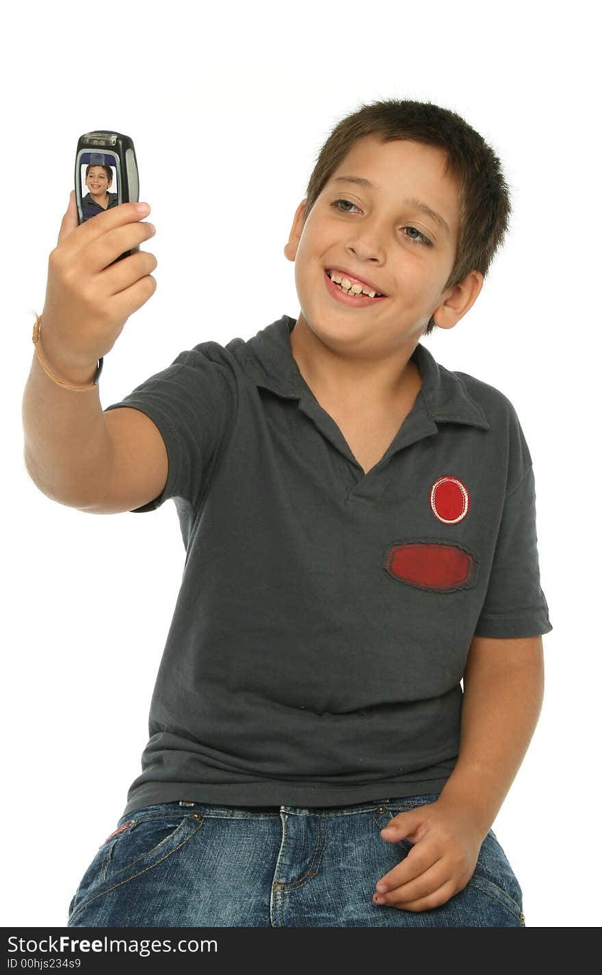 Boy taking his photo with a mobile phone. Boy taking his photo with a mobile phone