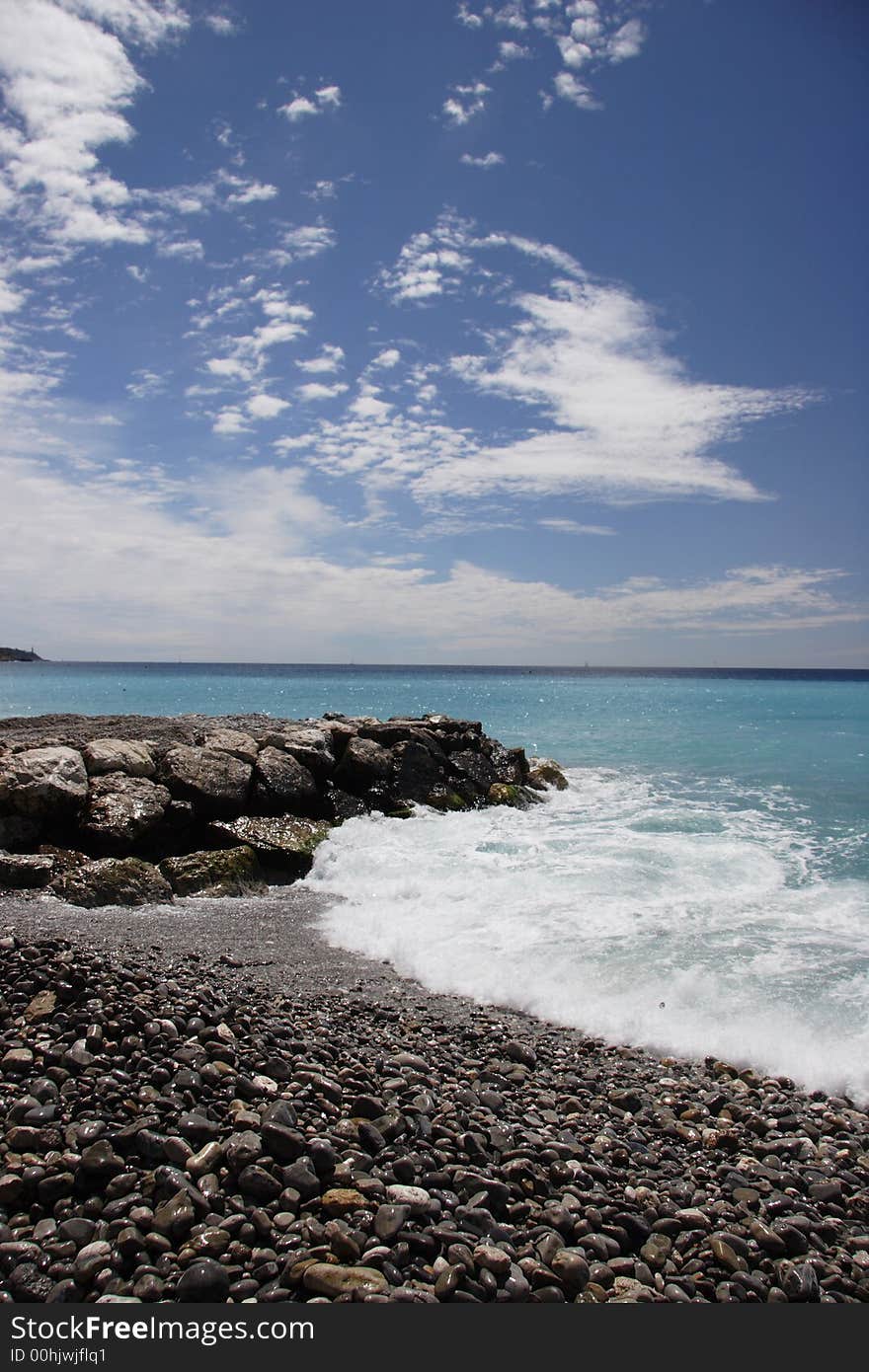 Waves on the groin - portrait, Nice, France