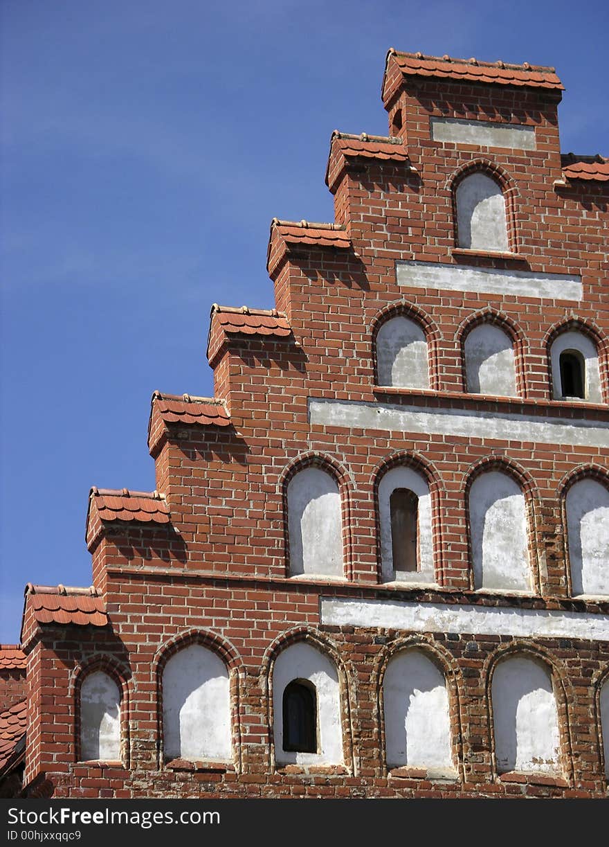 The facade of a gothic style house in the old town of Kaunas city, Lithuania. The facade of a gothic style house in the old town of Kaunas city, Lithuania.