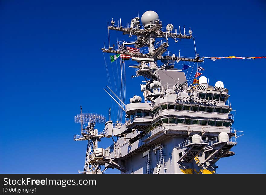 The aircraft carrier USS Abraham Lincoln docked at the Port or Everett Naval Station, WA. The aircraft carrier USS Abraham Lincoln docked at the Port or Everett Naval Station, WA