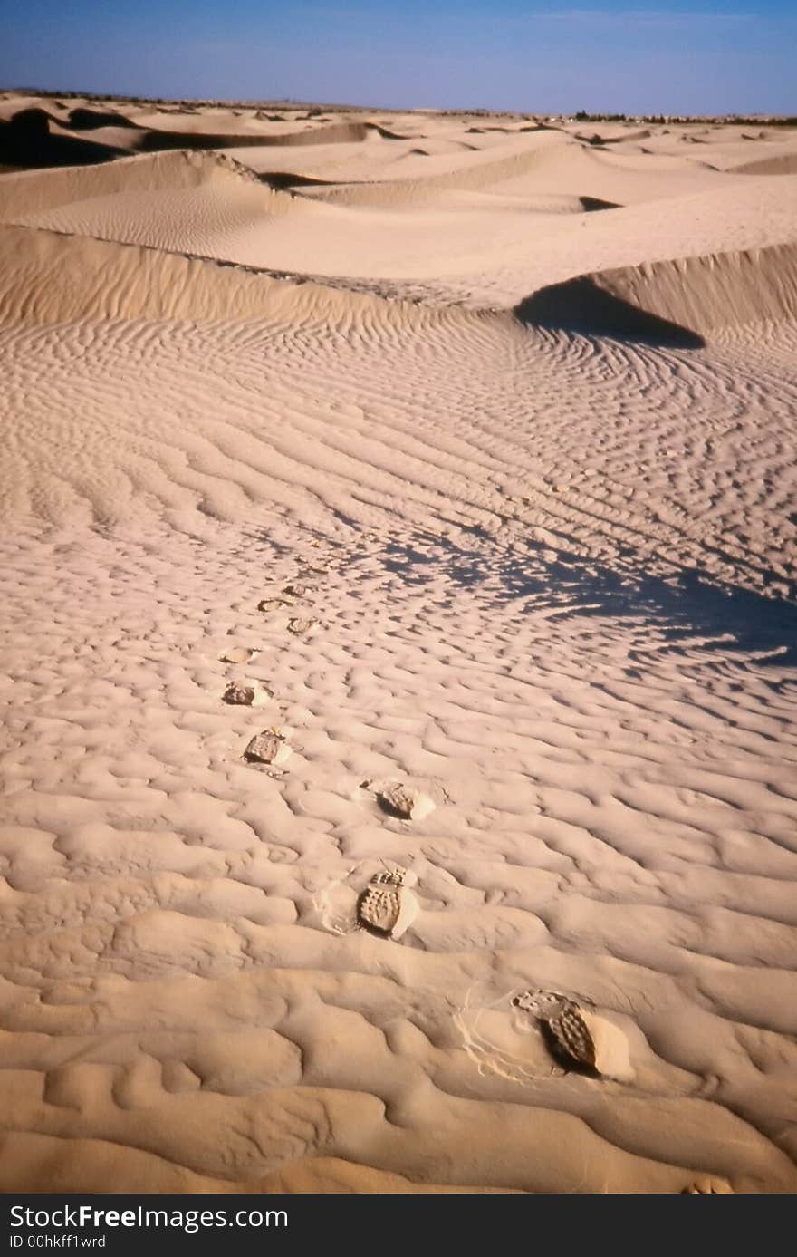 Footprints on desert sand