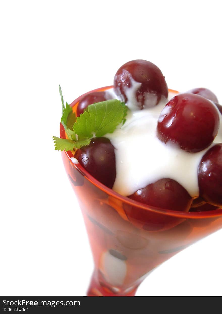 Dessert in glass isolated on white(cherry with cream)