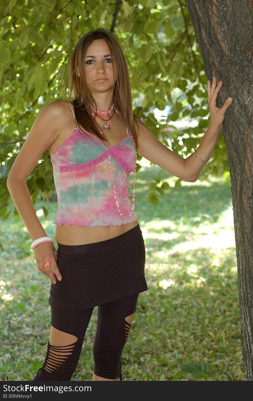 Young woman relaxing in the forest. Young woman relaxing in the forest