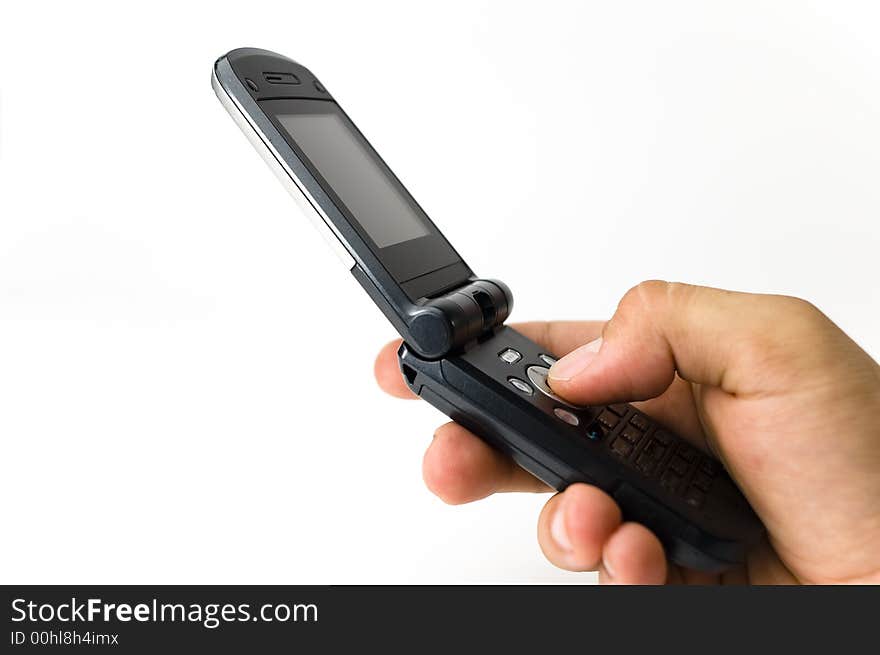 An Isolated hand holding a handset in a white background. An Isolated hand holding a handset in a white background