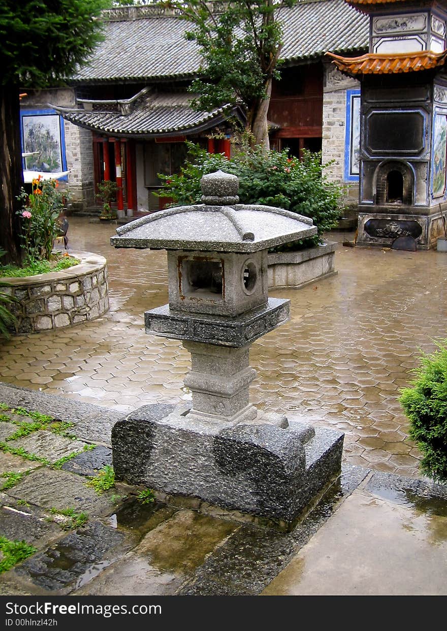 Stone Lamp in a garden of an Ancient Temple, Yunnan, China. Stone Lamp in a garden of an Ancient Temple, Yunnan, China