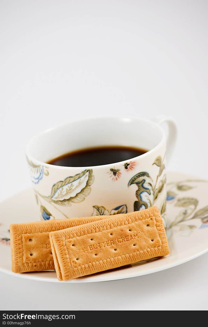 A cup of coffee with biscuits. A cup of coffee with biscuits