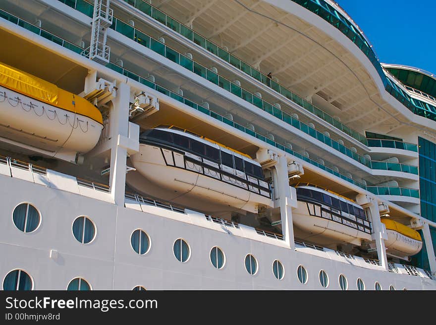 Cruise ship hull, balconies & rescue boats. Cruise ship hull, balconies & rescue boats.