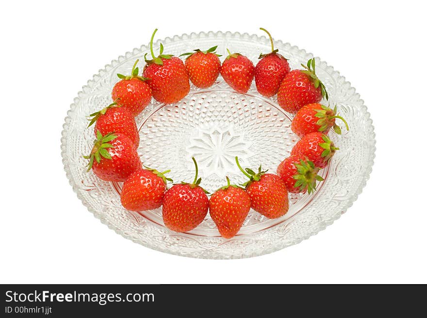 Strawberries on a glass dish, isolated on white background. Strawberries on a glass dish, isolated on white background