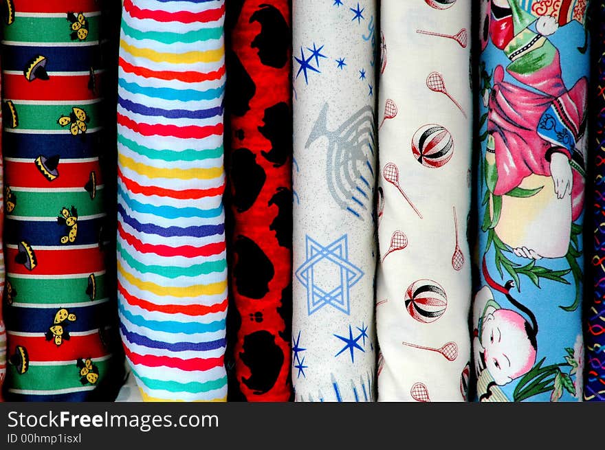 Fabric stock available for sewing and making garments.