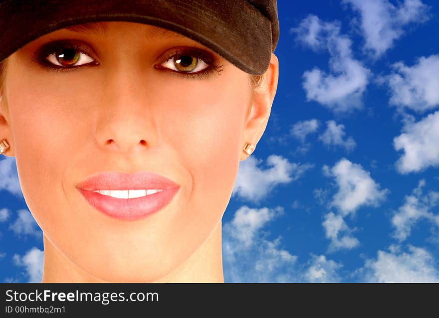 Young Girl In Cap With a Blue a blue sky