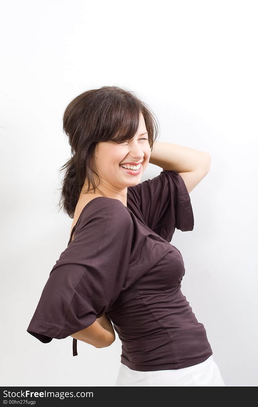 Beautiful white woman in a evening gown on a white background