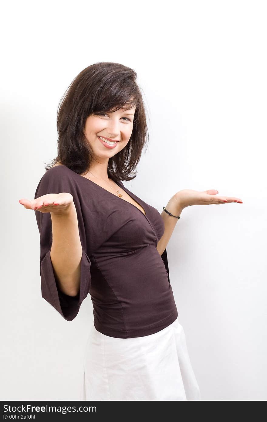 Beautiful white woman in a evening gown on a white background