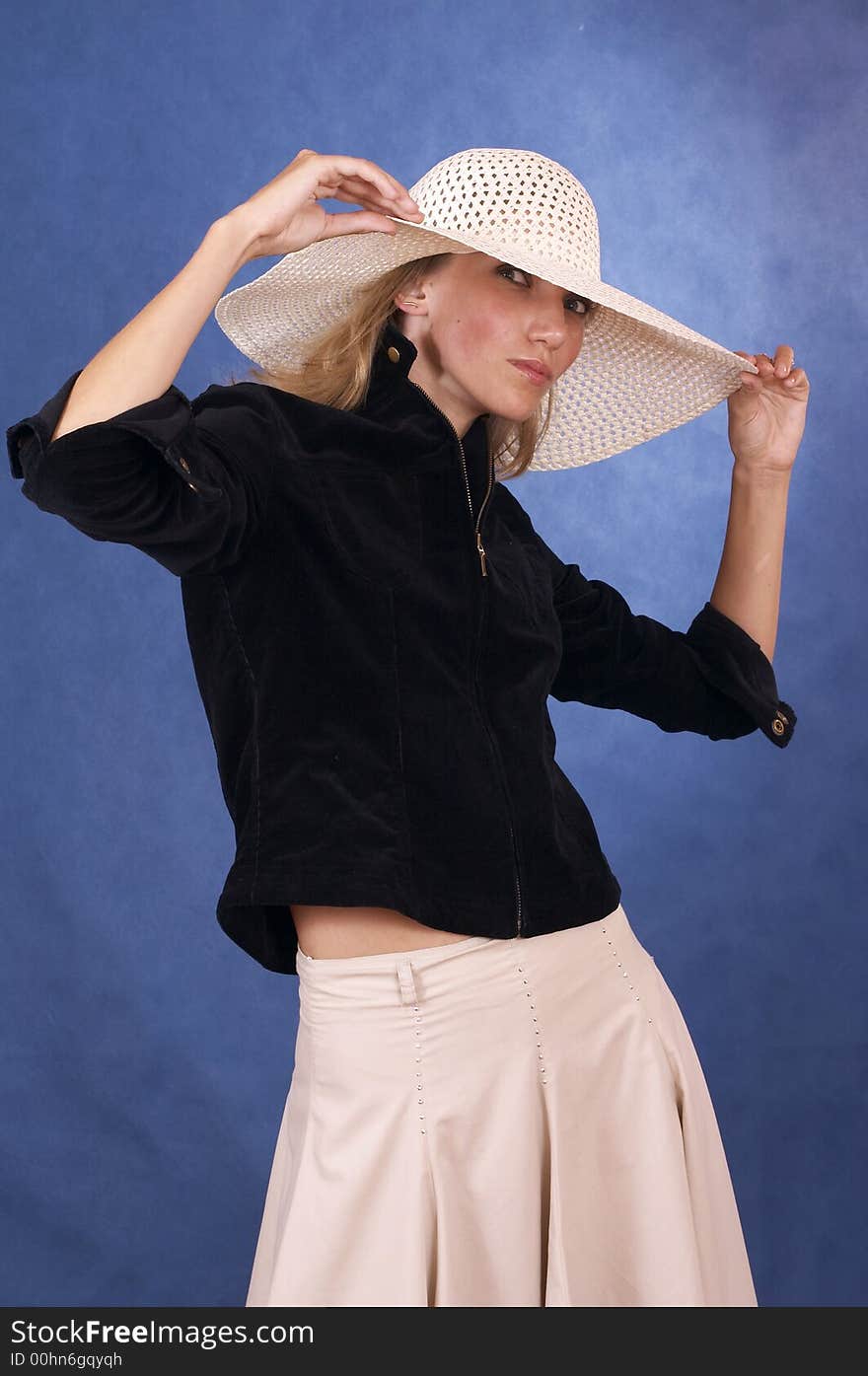 Woman and a big summer hat. Woman and a big summer hat