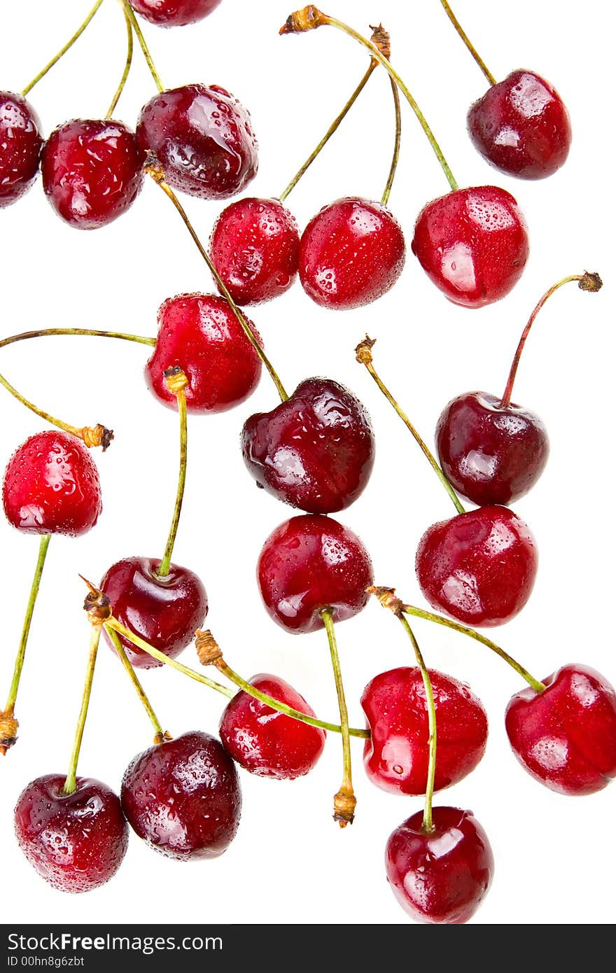 Cooled sweet cherries in drops of waters shined from below. Cooled sweet cherries in drops of waters shined from below