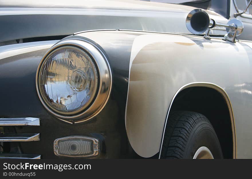 Classic and vintage cars - headlight and klaxon close-up 1950s