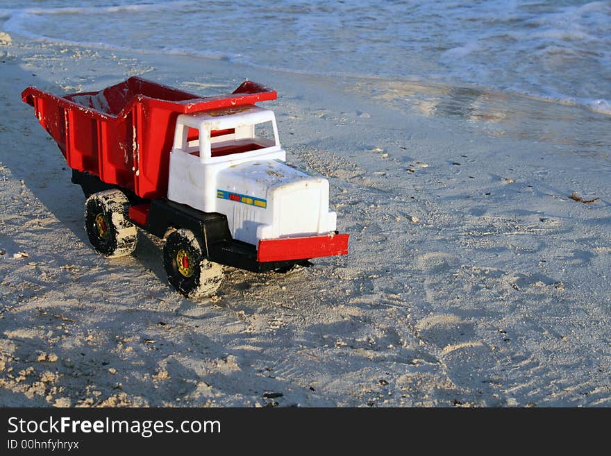 Nice truck on the sandy beach with sea in background. Nice truck on the sandy beach with sea in background...