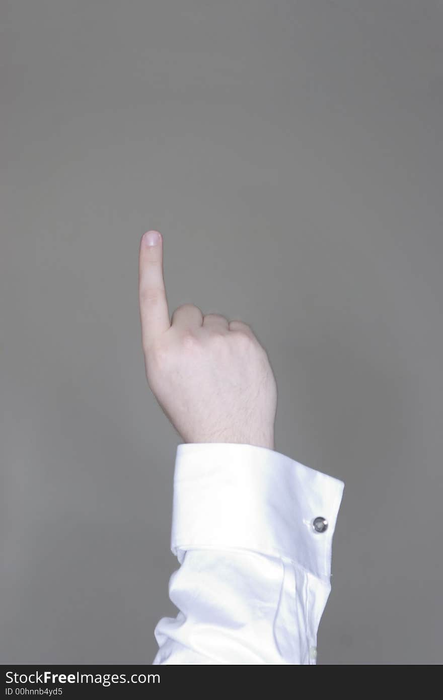 Businessman pointing up