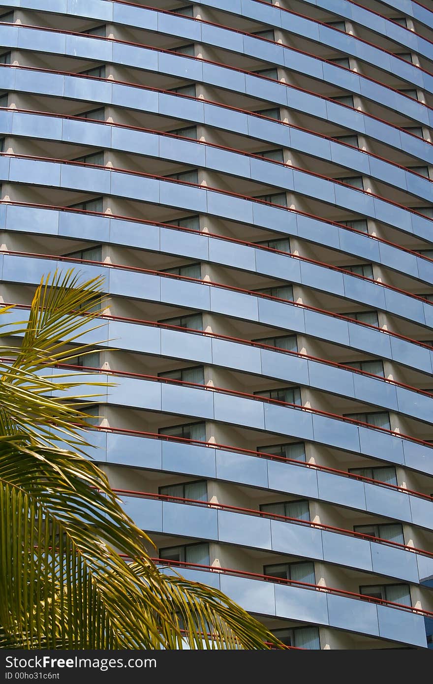 Abstract of High-rise Building with palm trees.