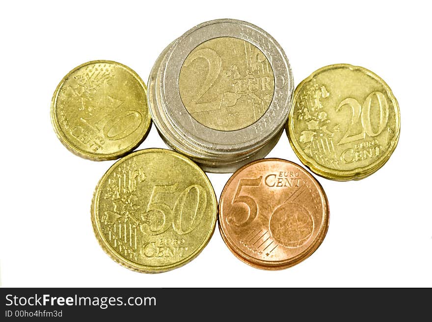 Euro coin piles isolated on white