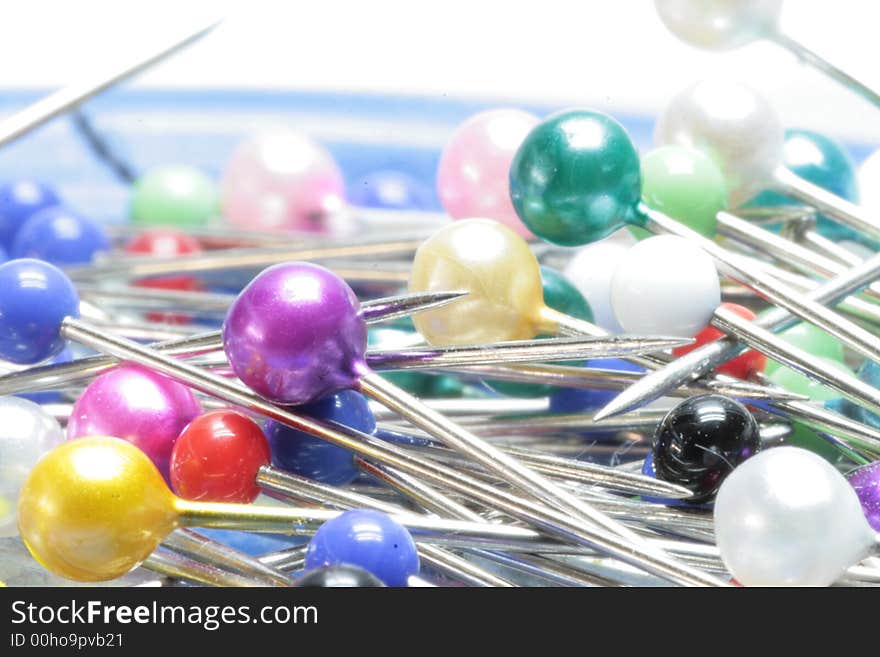 Close-up of pins with multicolored head. Close-up of pins with multicolored head