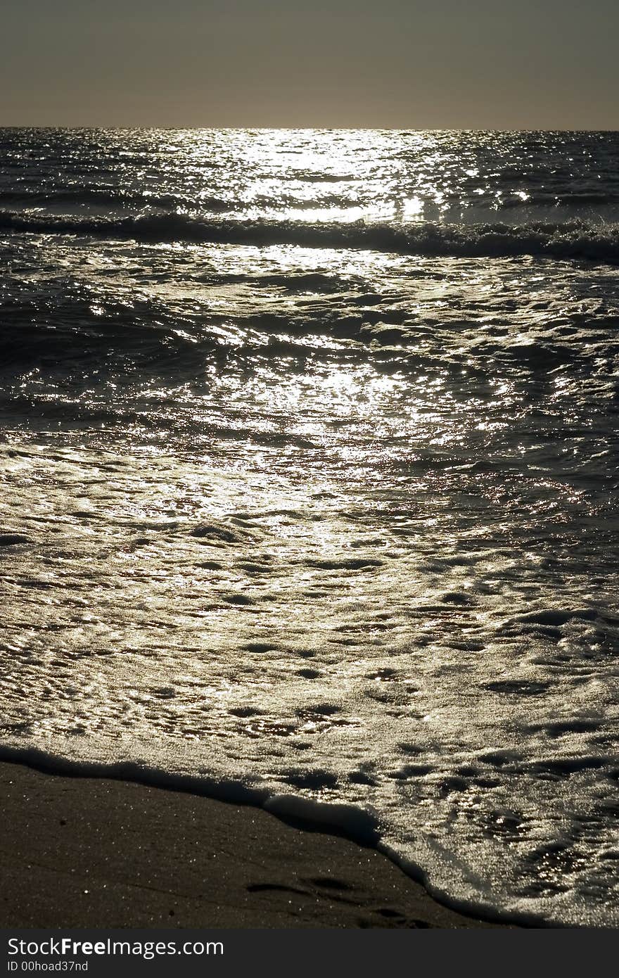 The European summer beach scene. Back lighting.